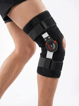 Flexa Hinged Brace bilateral alloy hinge at 90-degree flexion, close-up detail engineering