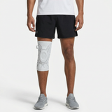 Flexa Adjustable Brace front view — person wearing knee support, premium studio